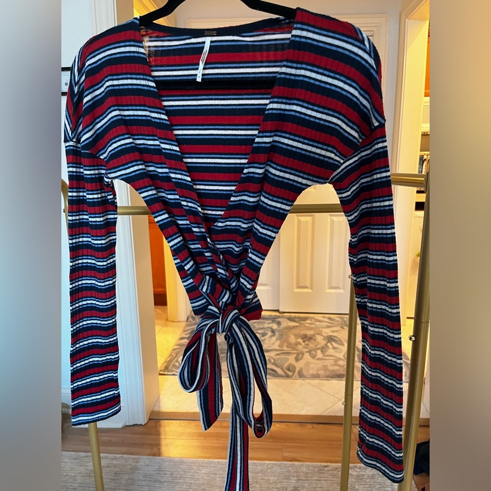 Free people small- worn once. Long sleeve tie top. Red white blue stripes